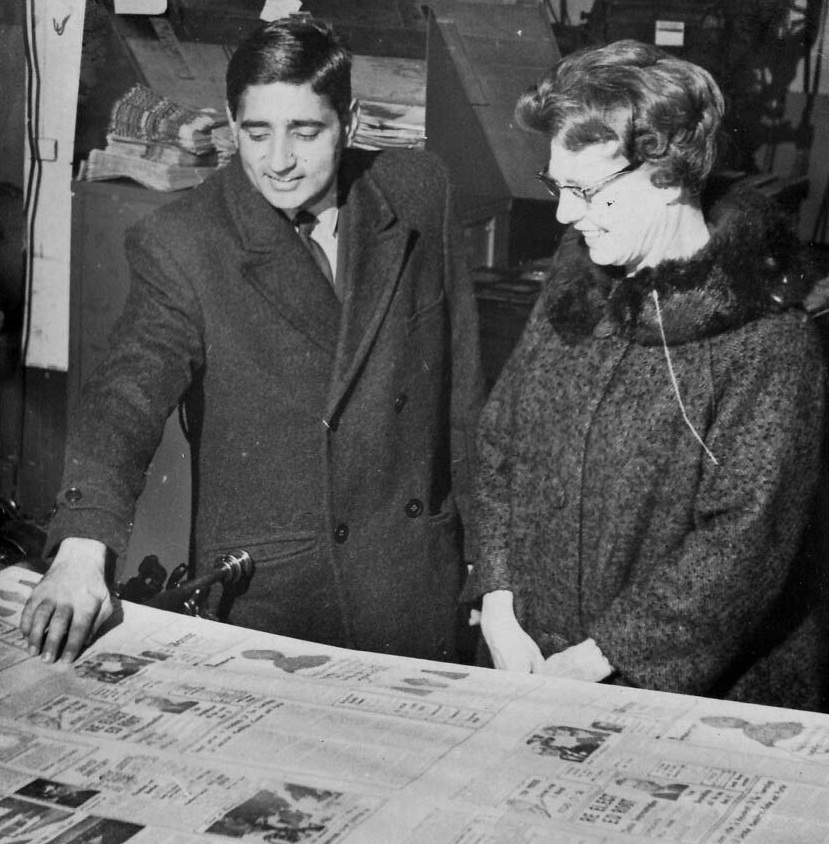  Govindlal Vora giving the information about newspaper to Margaret Thacker 