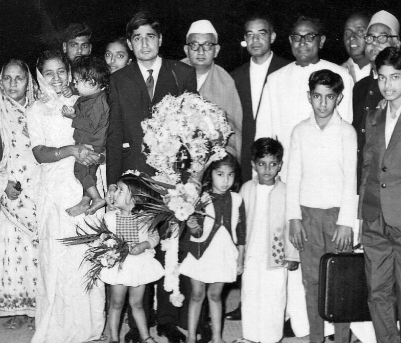 Whole Vora family welcoming the Shri Govindlal Vora after returning from foreign trip include his elder brother Motilal vora, wife Prakash Vora son Girish Vora , daughters Ranjana and Vandana holding bouquet in the hand.